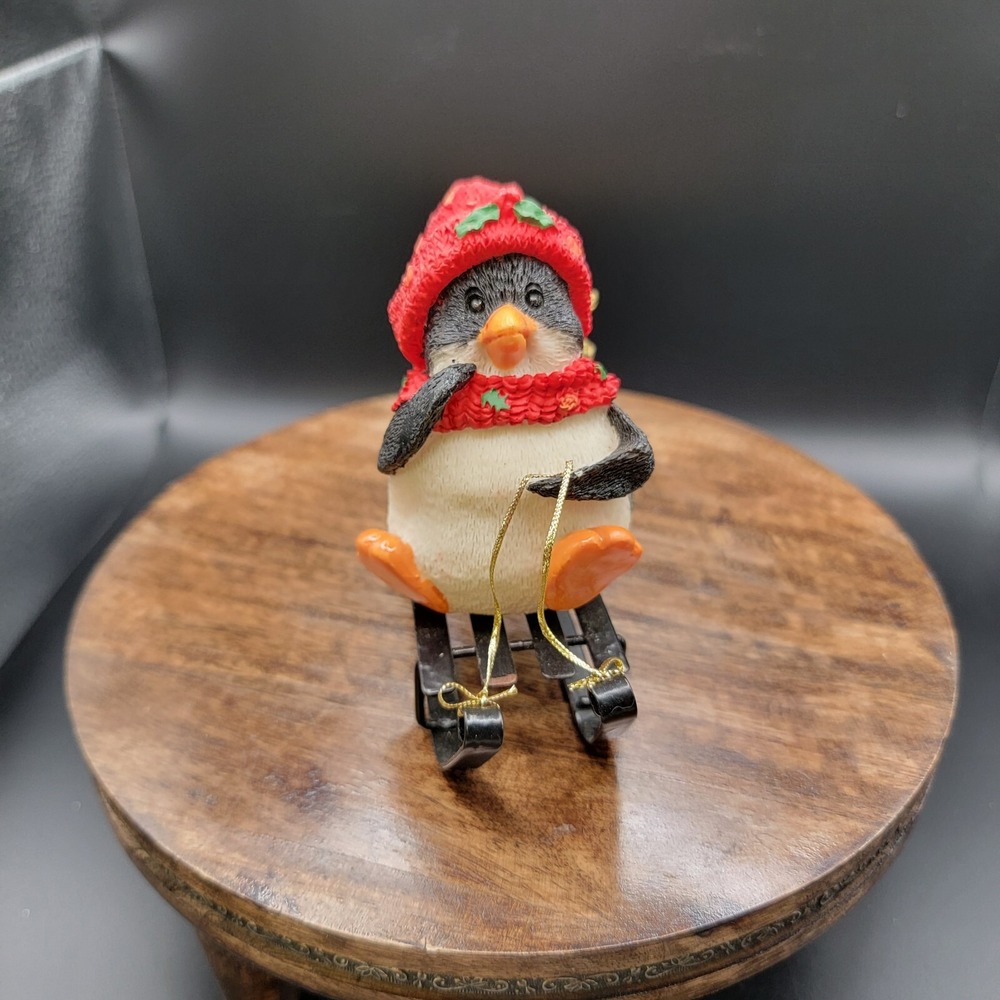 Sled Skiing Christmas‎ Penguin Figurine